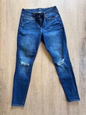 GAP Women's Skinny Jeans in Dark Blue with Knee Rips